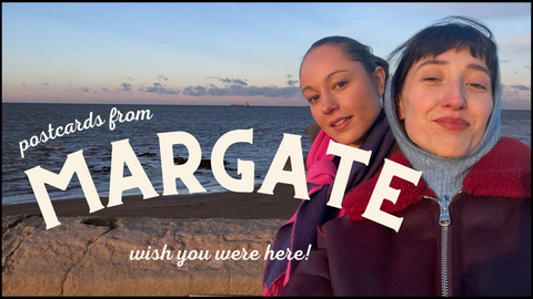 two women on the beach in Margate at sunset in style of vintage postcard