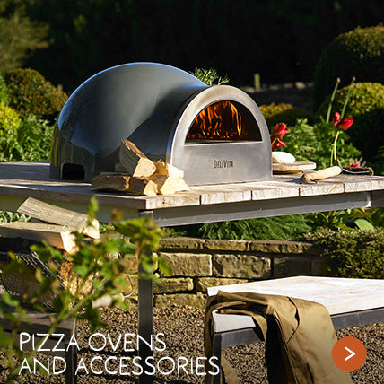 A pizza oven outdoors on a bright, sunny day