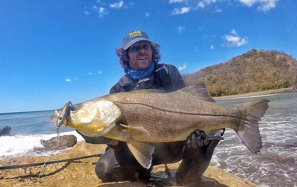 Samson Lures' Grant Woodgate with a snook caught on an air brushed Enticer Sub Surface Tweak Bait