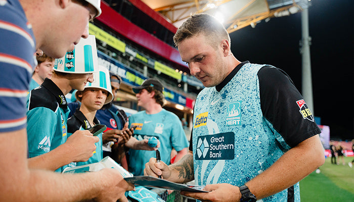 Josh Brown signs autographs