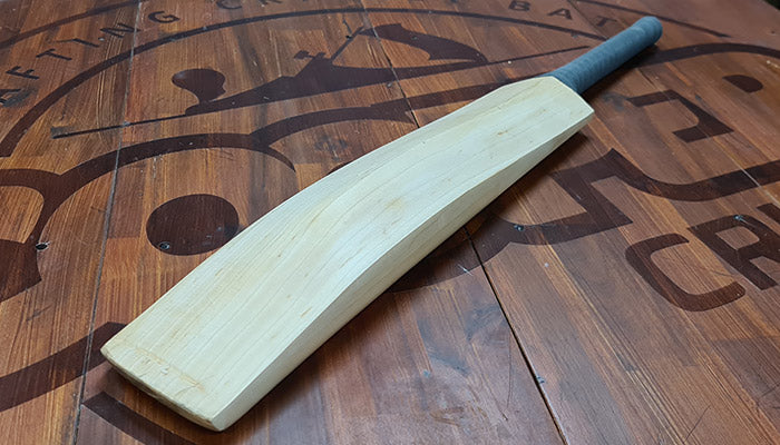 Repaired cricket bat at Cooper Cricket Brisbane workshop by Rod Grey