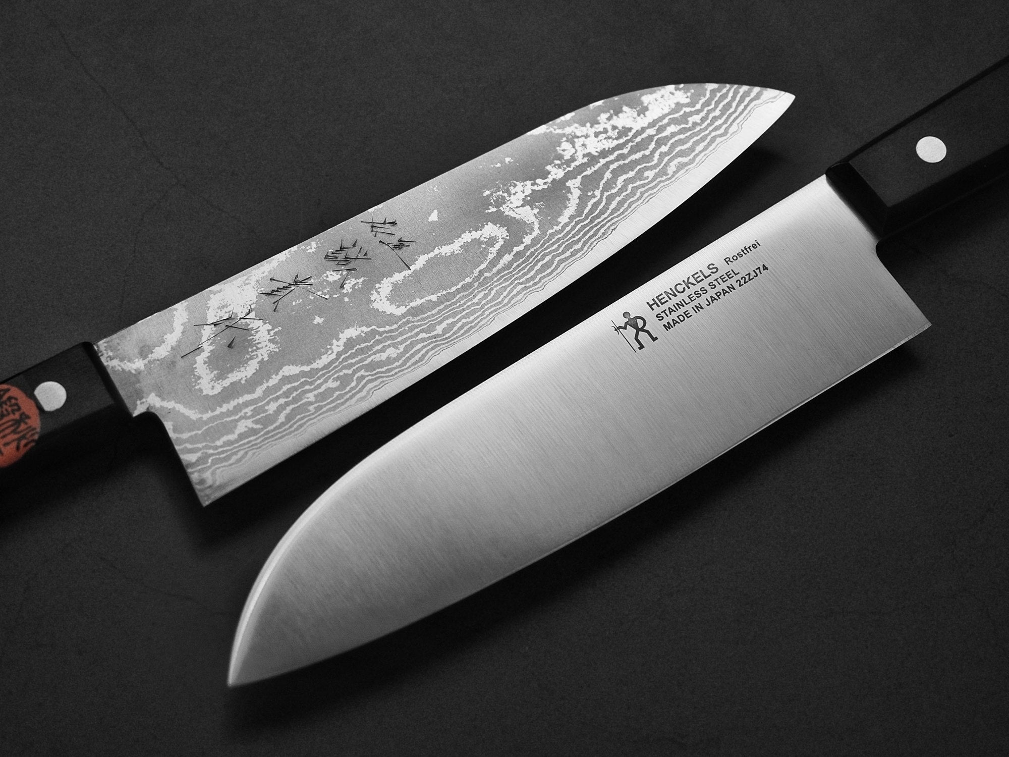 a fancy damascus finish on a santoku knife compared to a simple finish on a western knife