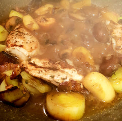 Chicken, leek, pancetta and apple cooking in pan