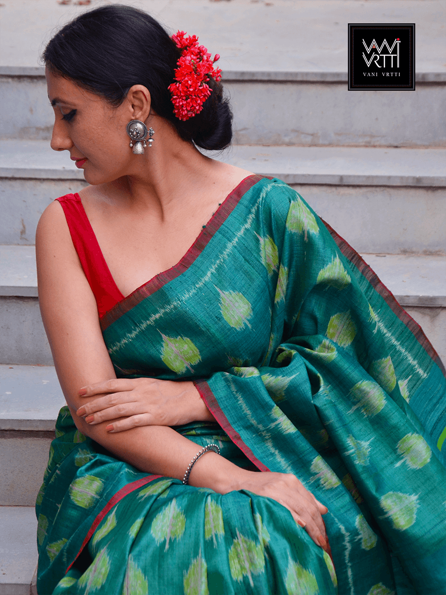 a women in peepal design handspun tussar silk saree