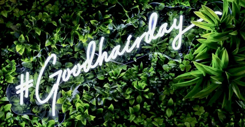 Example of LED Flex Neon sign with #Goodhairday written in White cursive script