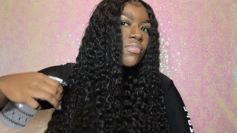 spray curly wig with water to get wet look