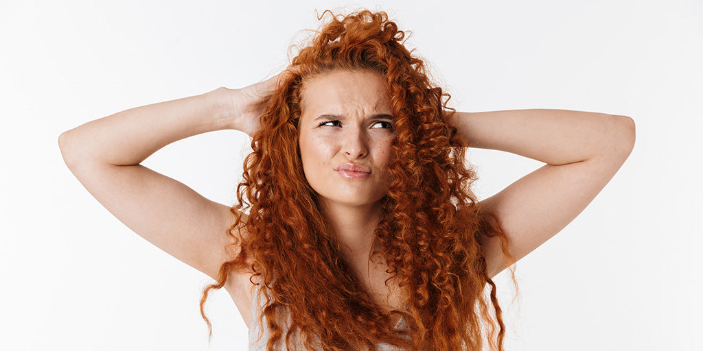 what causes hair shrinkage