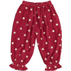 Girls clothes. Bubble pants in red corduroy with gold printed polka dots