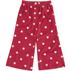 Children's clothing. Red corduroy pants with printed gold polka dots