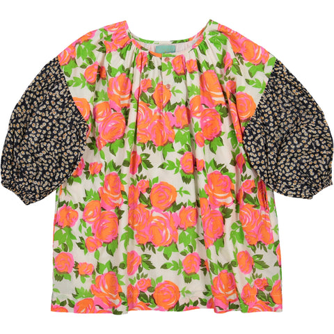 Girl's clothes. Girl dress with pink flowers print and bubble black liberty print sleeves