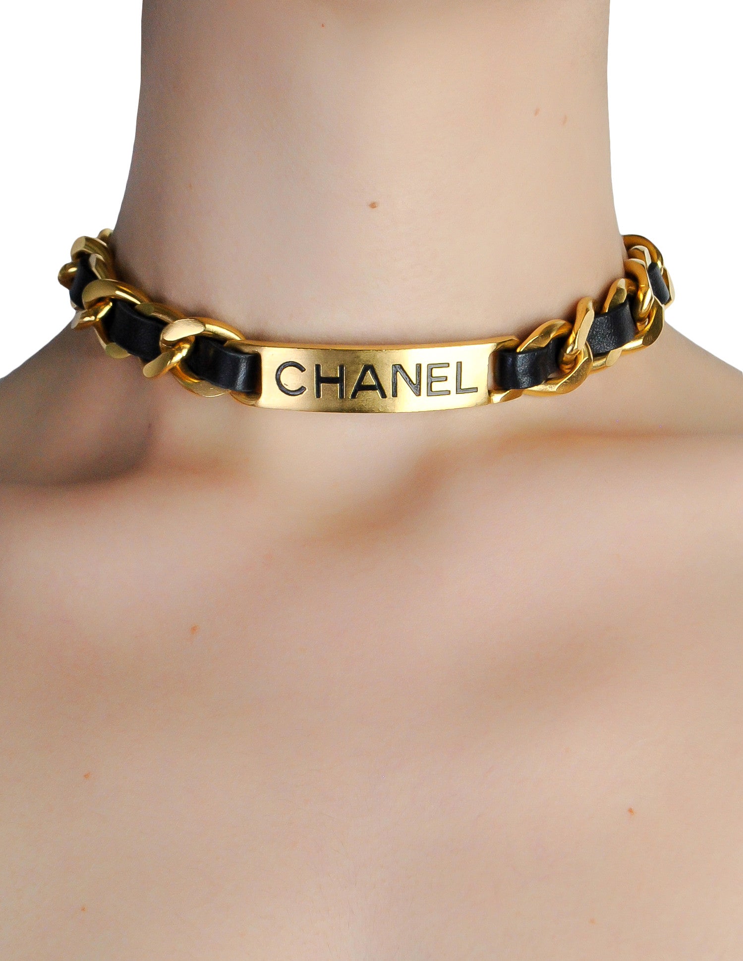black choker with gold chain