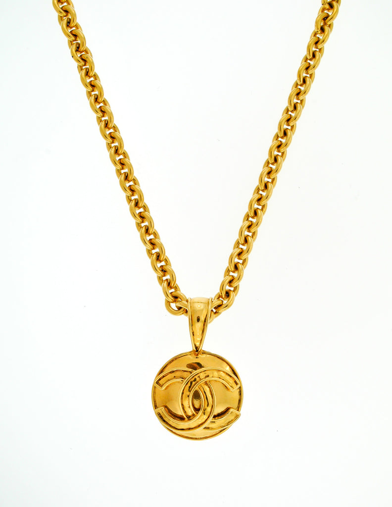 Bonhams  CHANEL QUILTED CC LOGO PENDANT NECKLACE IN GOLD TONED