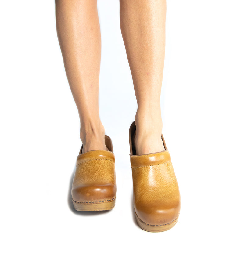 honey dansko clogs