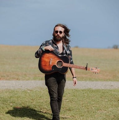 Jesse O'Neill with his Pratley Guitar