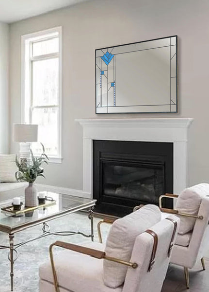 Art deco stained glass mirror hangs over fireplace