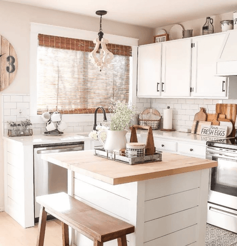 Small Kitchen Looks Bigger with decorative trays for organization