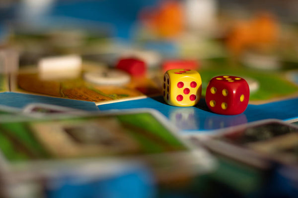 Colorful Dice on a board game