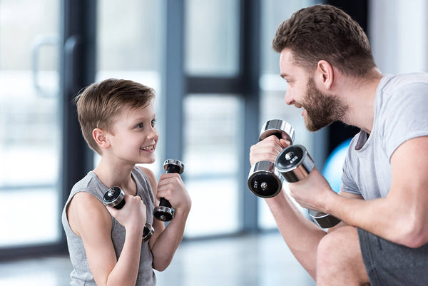 Father and Son with dumbells
