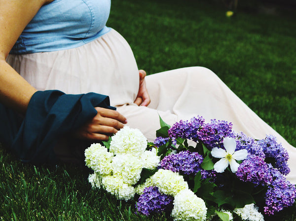 Pregnant lady on the grass
