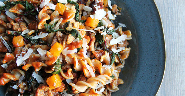 Pasta with sausage, butternut squash and pumpkin mole sauce