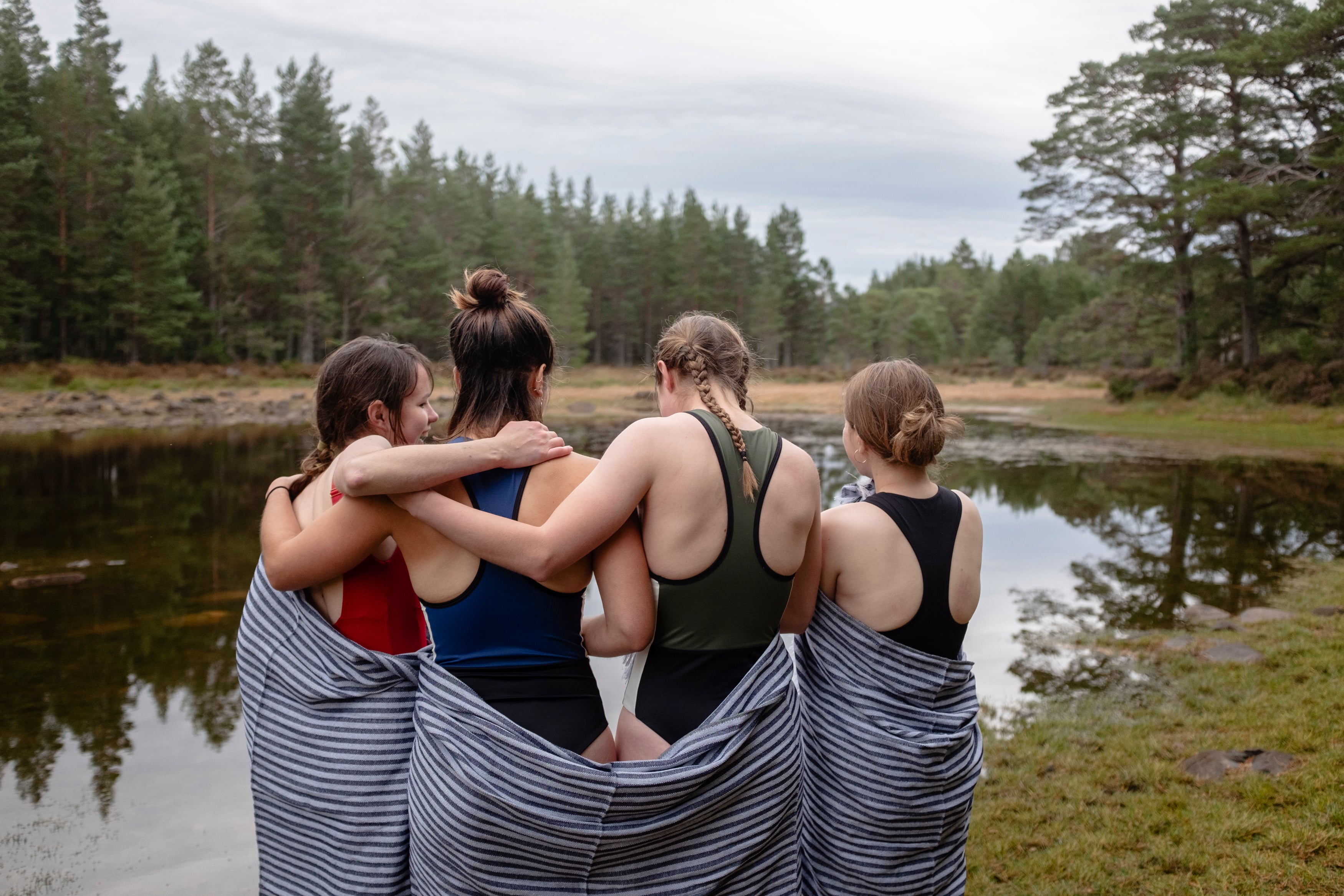 Women wearing Stay Wild swimwear in Scotland’s Cairngorm mountains