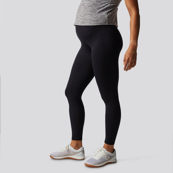 Best Maternity Workout Clothes - Nike One Women's High-Waisted Leggings ( Maternity) - Testing on a deck on a mountain – iRunFar