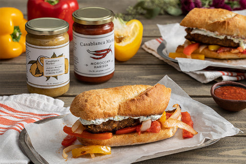 Grilled Merguez Sandwiches With Caramelized Onions, Manchego, and Harissa  Mayonnaise Recipe