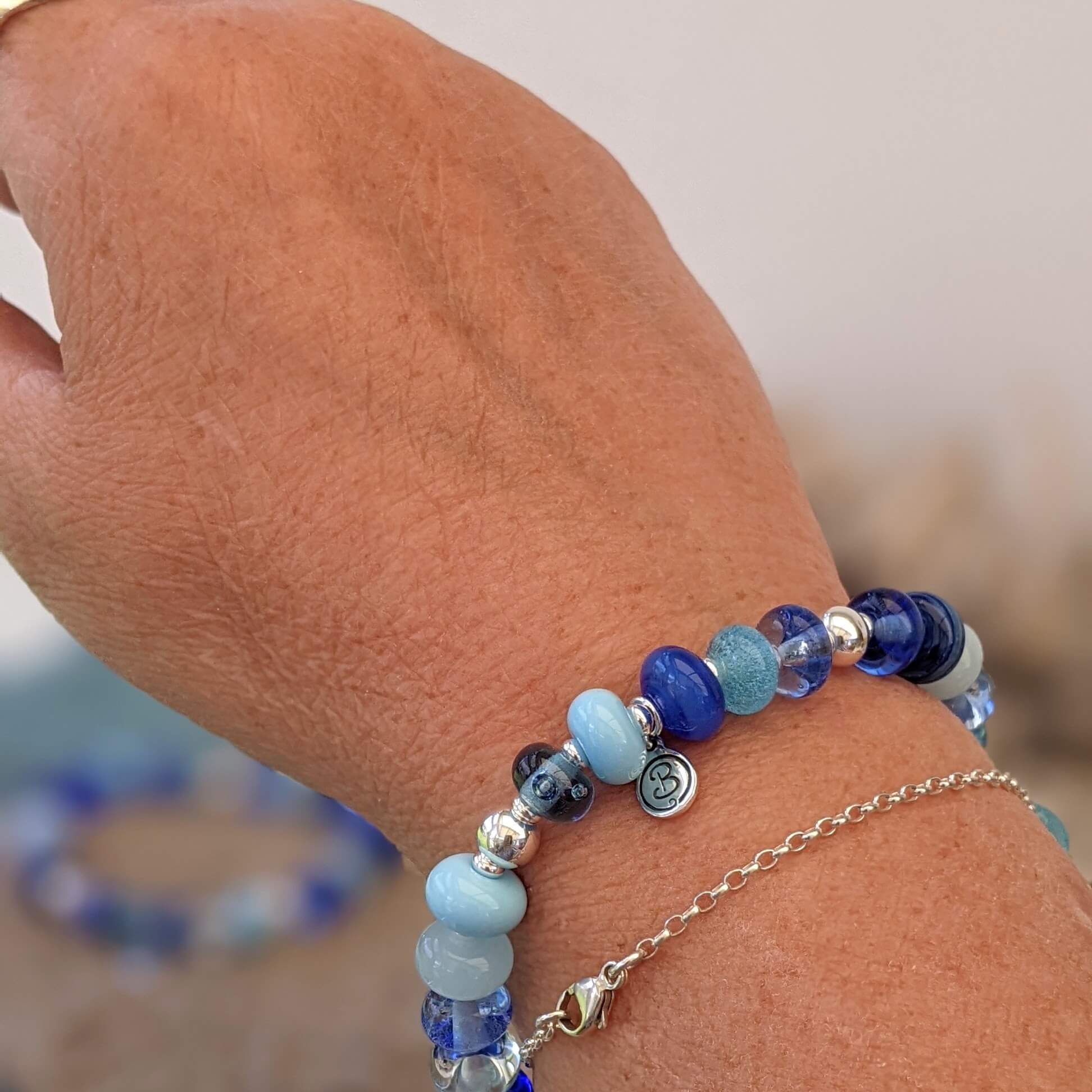 Adjustable Crystal and Glass Beaded Blue Wristband Bracelet  Inspiration  in Blue  NOVICA