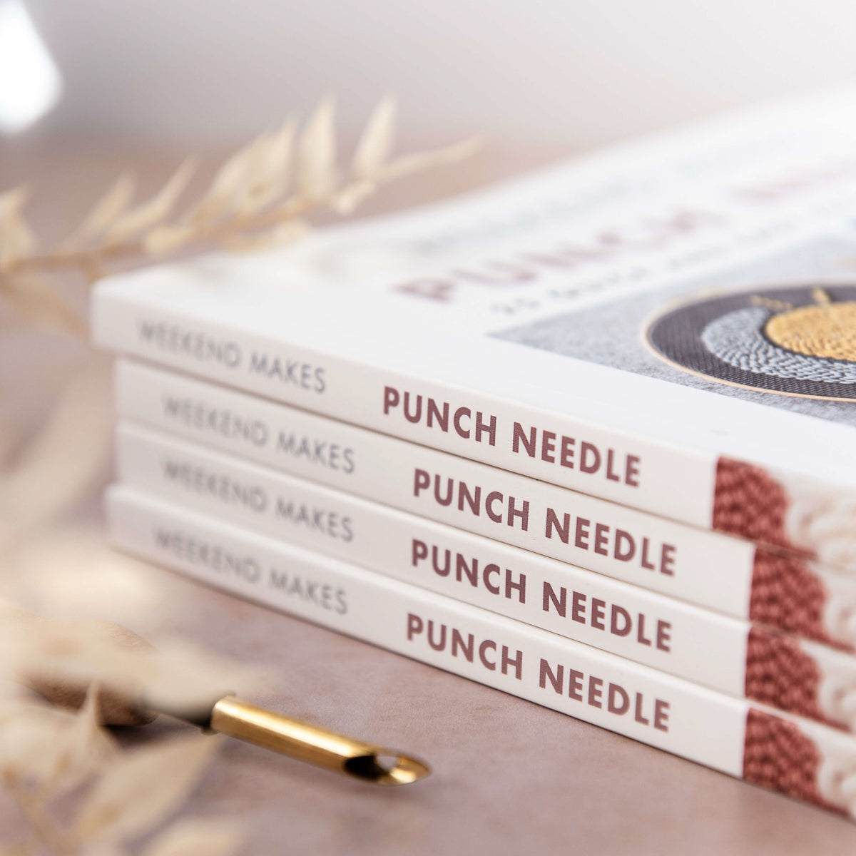 Stack of Weekend Makes: Punch Needle books