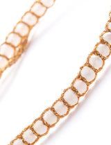 Armband aus Kristallsteinen mit goldenen Details
