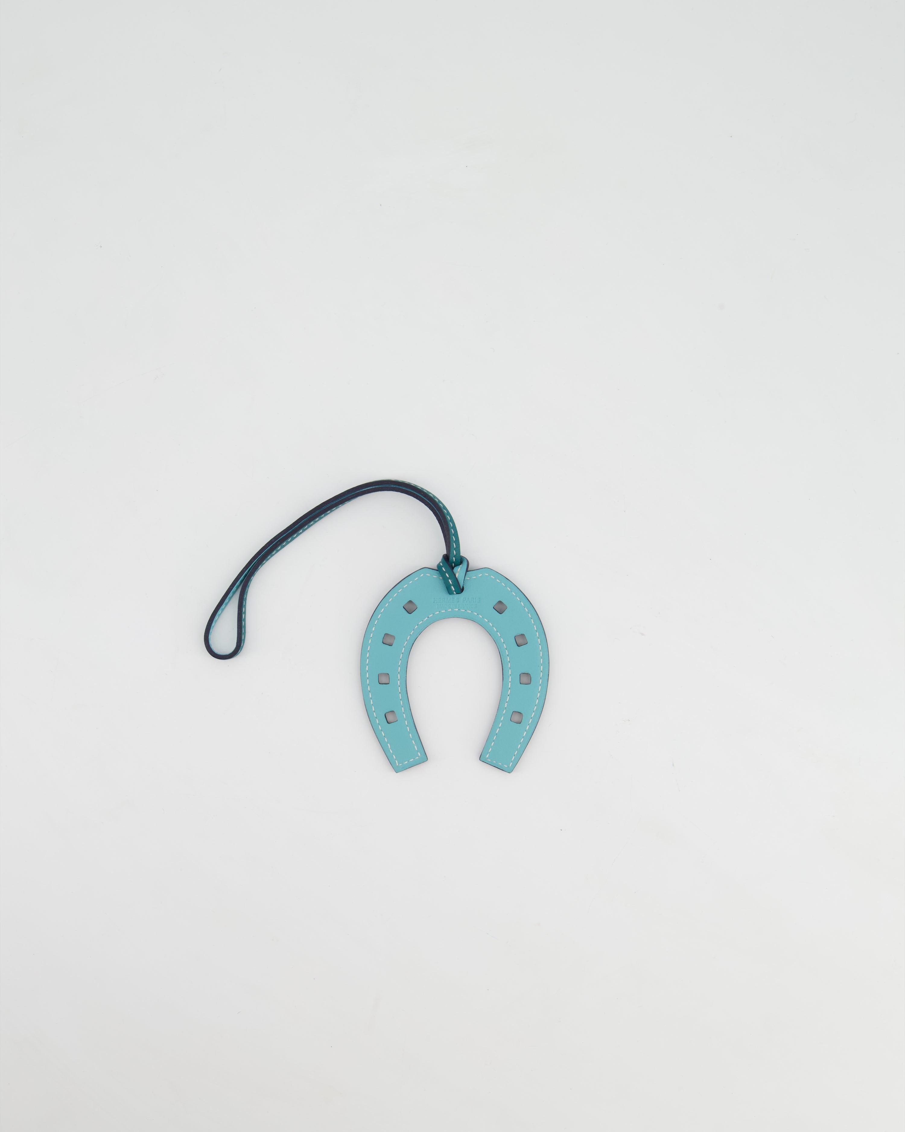 image of Hermès Swift Paddock Horseshoe Bag Charm in Malachite and Bleu Atoll