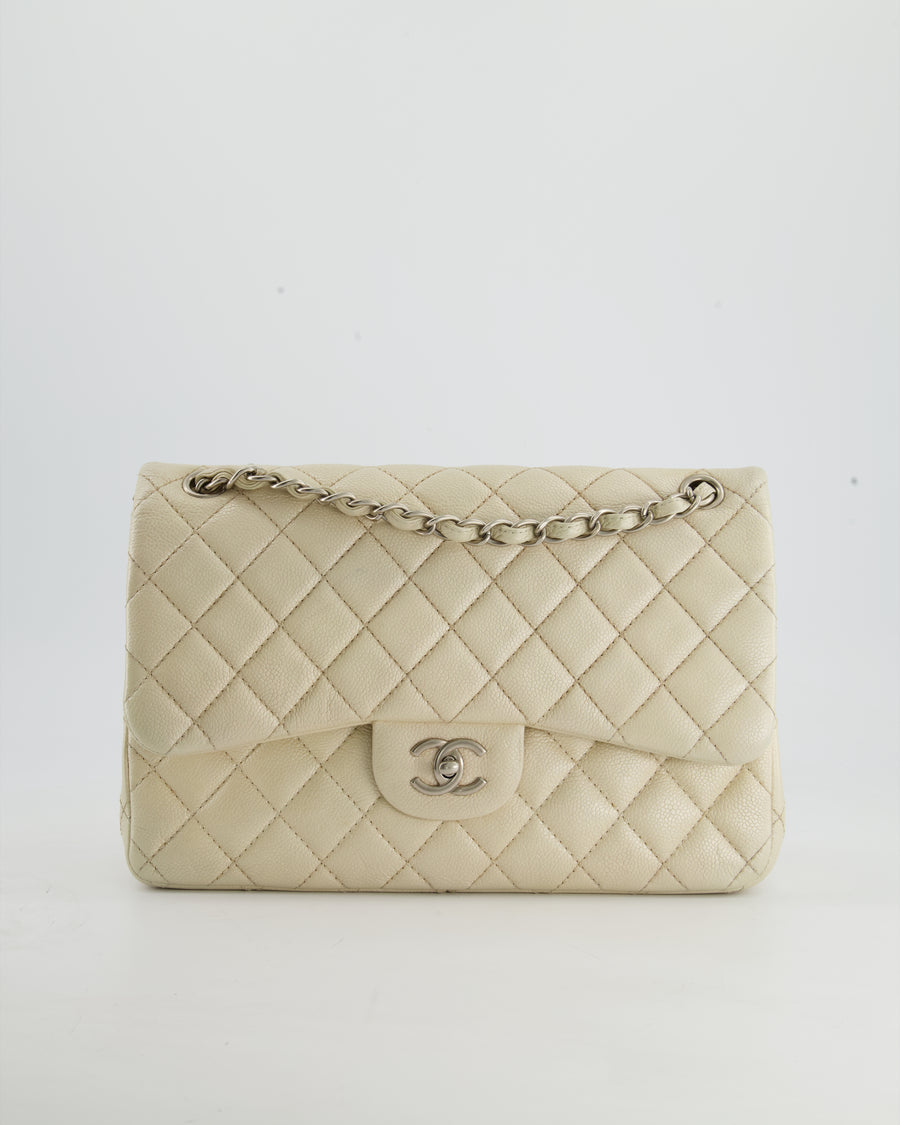 Chanel Pearlescent Ivory Caviar Jumbo Classic Double Flap Bag with Sil –  Sellier