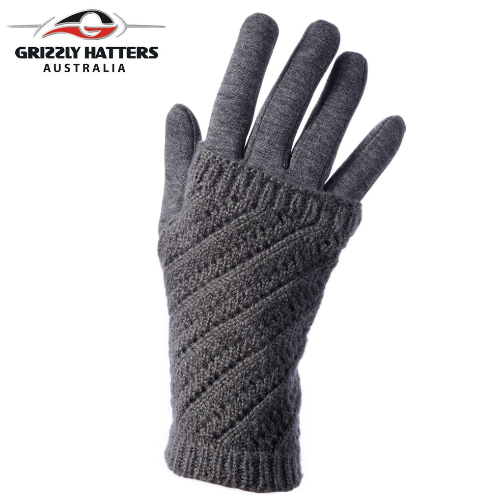 Premium Photo  Knitting gloves made of gray wool. top view.