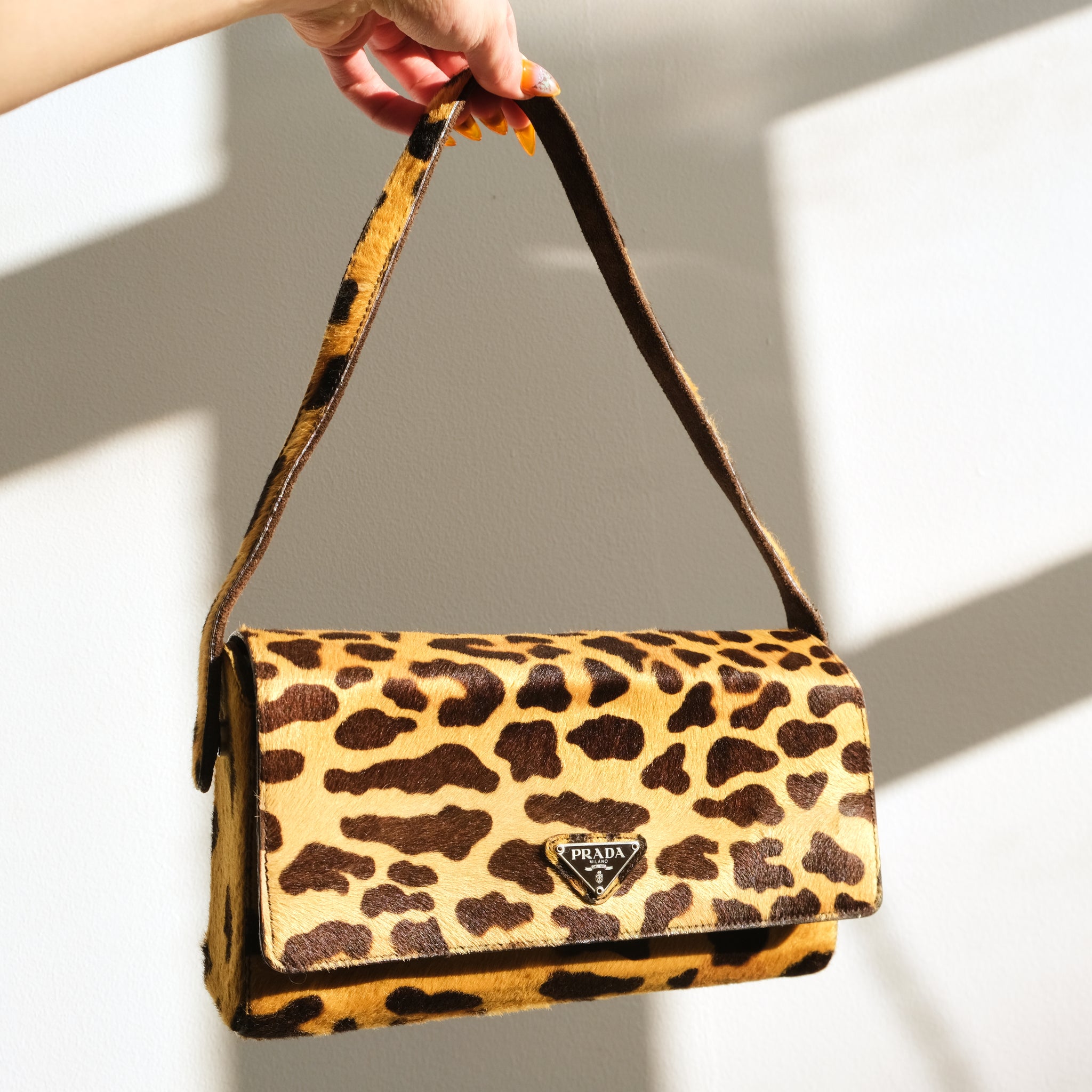 prada cavallino leopard bag