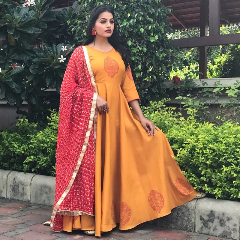 yellow dress with red dupatta