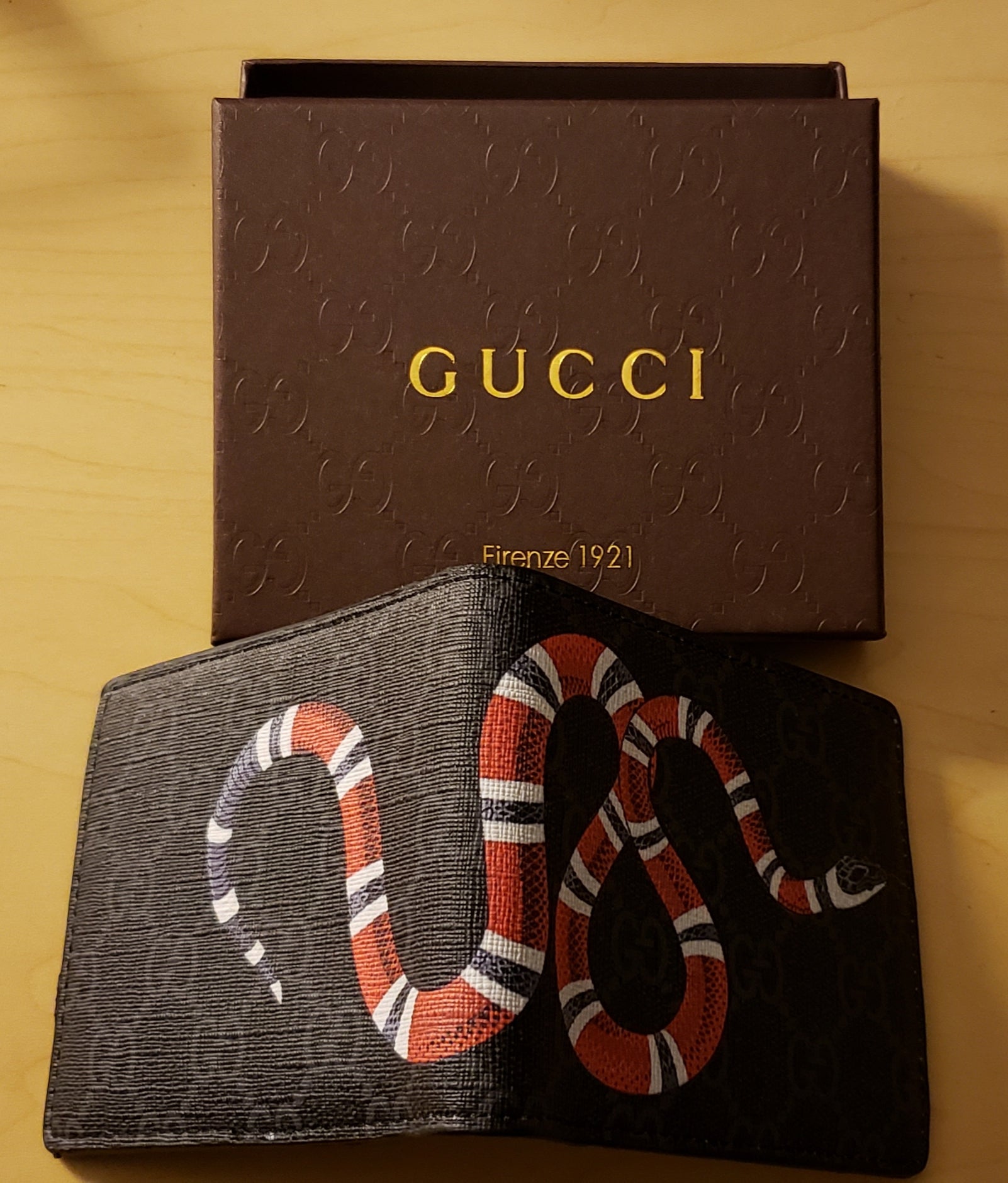 black gucci wallet with snake