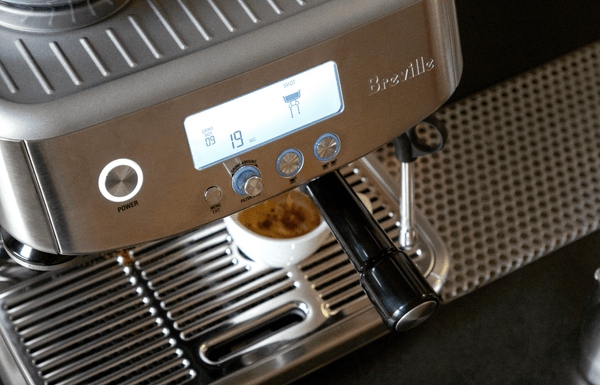 Photo of an at-home Breville espresso machine.