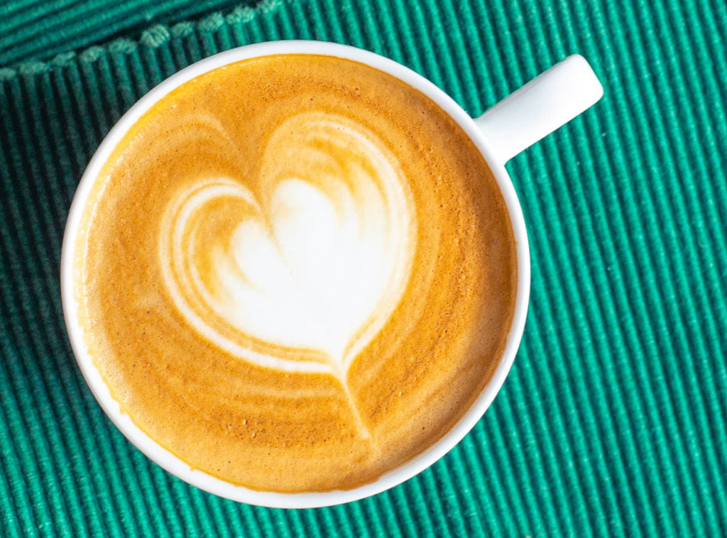 Photo of a heart latte art design.