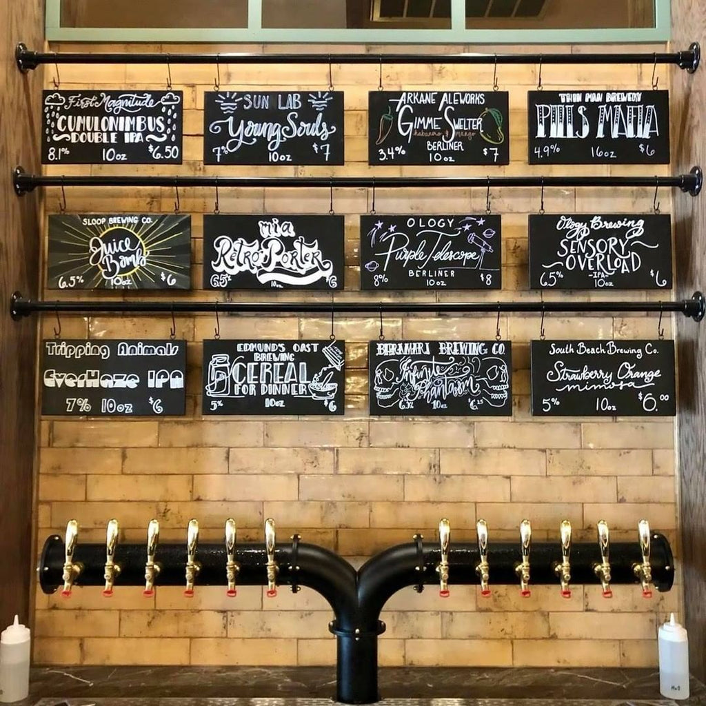 Photo of a wall of taps.