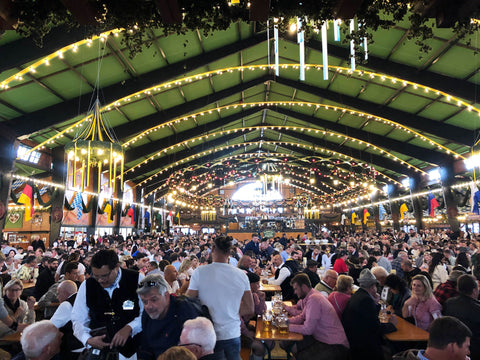 image of a crowded lowenbrau oktoberfest beer tent. oktoberfest tips for first timers