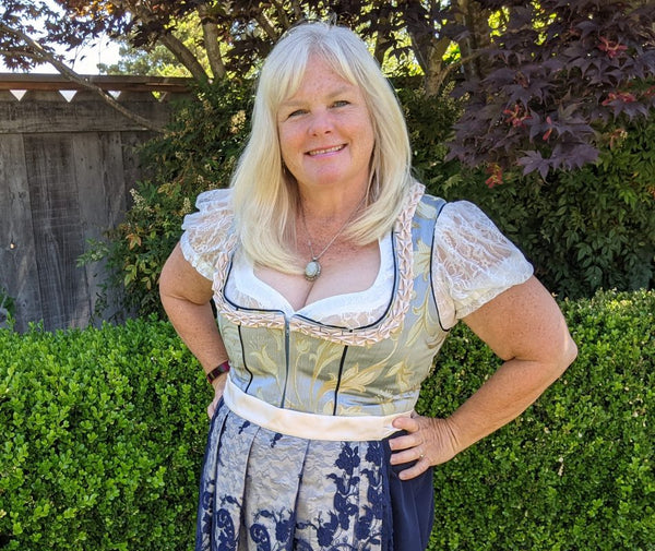 woman wearing a lovely dirndl dress plus size - german clothes