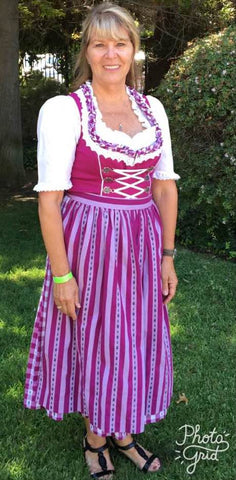 woman wearing a traditional Bavarian dress with long skirt length