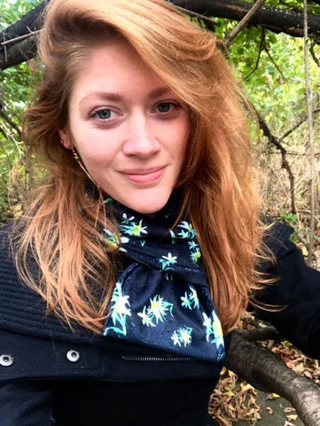 woman wearing an edelweiss flower scarf