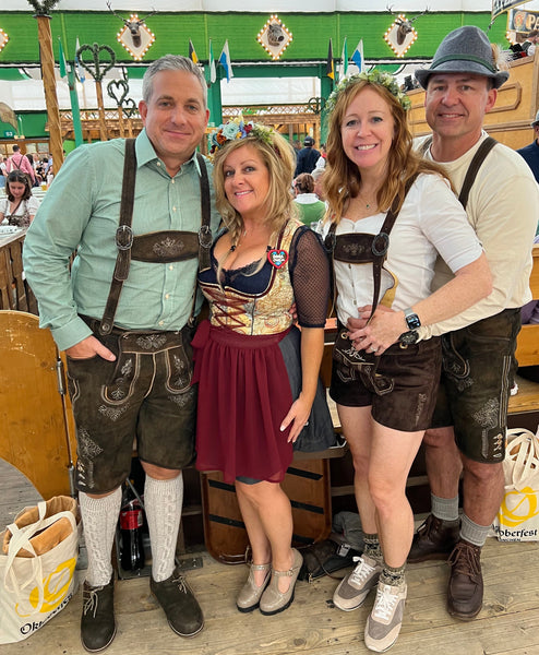 group of people at oktoberfest in munich wearing clothes from germany