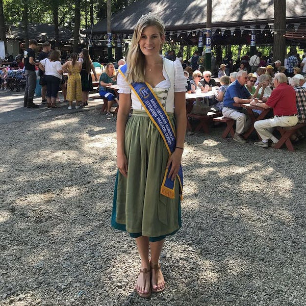 Miss German America wearing a dirndl dress at an event such at the Steuben Parade in NYC German Fest