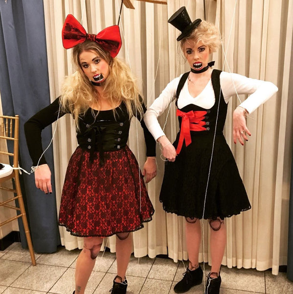 dirndl designer erika and her sister dressed as marionettes at the Chicago Fasching wearing dirndls