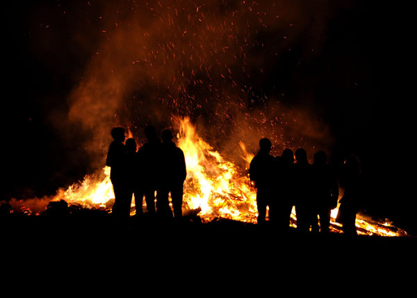 young people gather around a bonfire on walpurgis nacht in southern germany as a way to welcome in spring