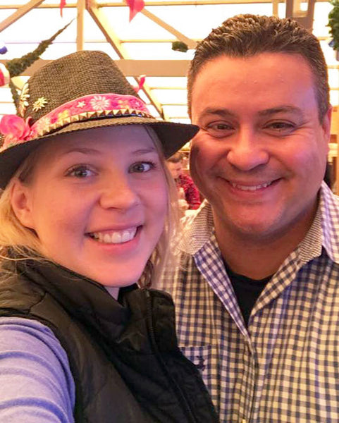 woman wear a german hat at oktoberfest instead of a maternity dirndl or traditional german clothing