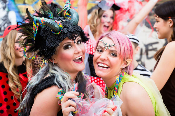 two individuals dressed up for germany's fasching