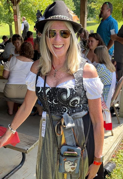 Woman wearing the Moon Rising Dirndl in Leo - Great dirndl blouse for summer event